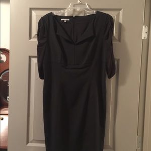 An elegant black three quarter sleeve dress.